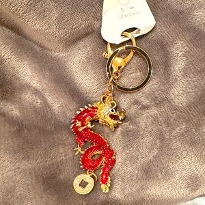 Beautiful red dragon, keychain, or bag accessory.